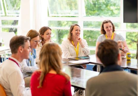A group of people at a meeting
